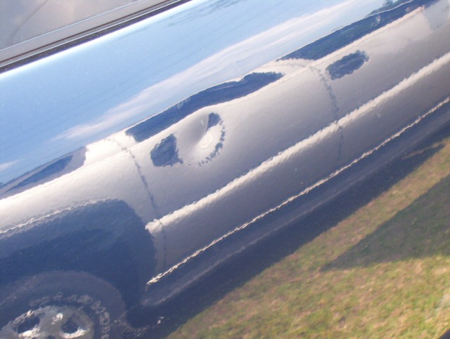 Paintless dent repair-Click on picture to return to Photo page