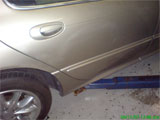 Chrysler LHS-Holy City Dent Guy-Paintless dent repair-Click for larger image